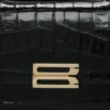 Borsa Dorian piccola in pelle nera goffrata Borsa Dorian piccola in pelle nera goffrata
