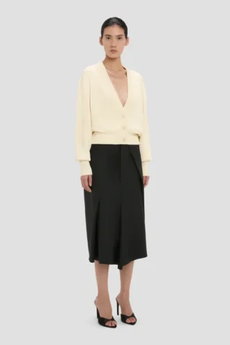 Cardigan con tasche a cavo in avorio