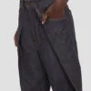 Dettaglio pieghe in jeans indaco Dettaglio pieghe in jeans indaco