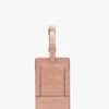 Etichetta per bagaglio in pelle goffrata effetto coccodrillo rosa cipria Etichetta per bagaglio in pelle goffrata effetto coccodrillo rosa cipria