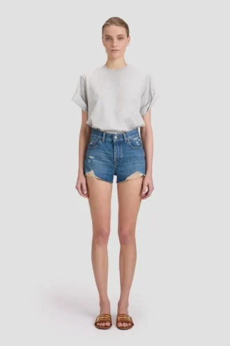 Pantaloncini effetto consumato in lavaggio blu medio