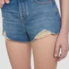 Pantaloncini effetto consumato in lavaggio blu medio Pantaloncini effetto consumato in lavaggio blu medio