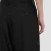 Pantaloni a gamba curva in nero Pantaloni a gamba curva in nero