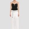 Pantaloni a gamba dritta con risvolto in bianco sporco