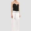 Pantaloni a gamba dritta con risvolto in bianco sporco