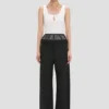 Pantaloni con inserti trasparenti in nero