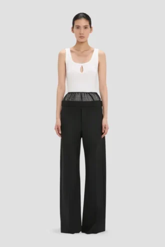 Pantaloni con inserti trasparenti in nero