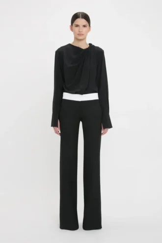 Pantaloni con pannelli laterali in nero
