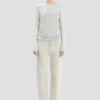 Pantaloni jogger con logo ricamato in grigio melange Pantaloni jogger con logo ricamato in grigio melange
