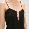 Top a spalline Rouleaux in nero Top a spalline Rouleaux in nero