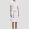Top con collo a polo in bianco Top con collo a polo in bianco