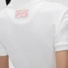 Top con collo a polo in bianco Top con collo a polo in bianco
