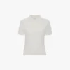 Top con collo a polo in bianco Top con collo a polo in bianco