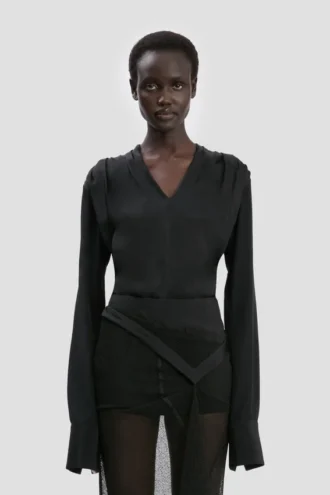 Top con scollo a V in nero Top con scollo a V in nero